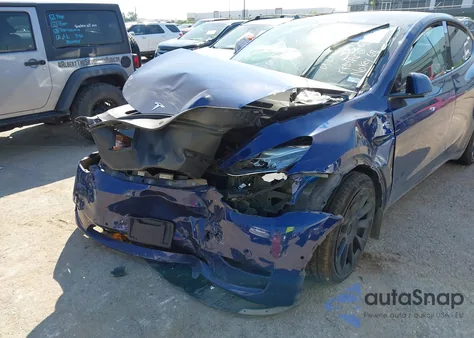 2022 Tesla Model Y Long Range Dual Motor All-Wheel Drive z USA, uszkodzony, nr VIN 7SAYGDEEXNF441415